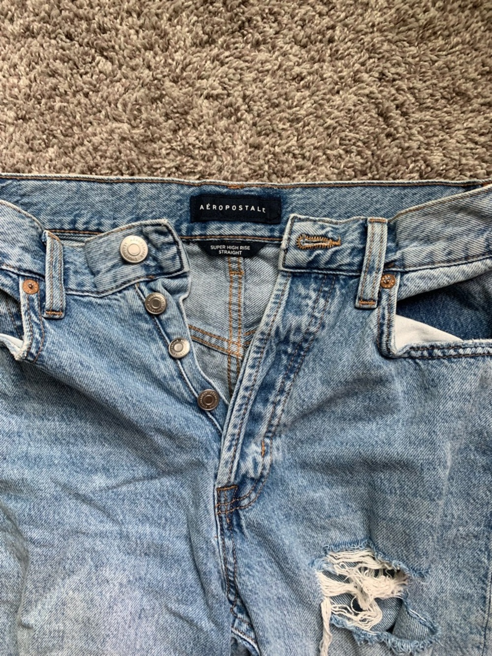 Light Wash Distressed Ripped Jeans - Picture 2 of 4